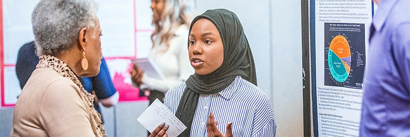 A student discusses her undergraduate research