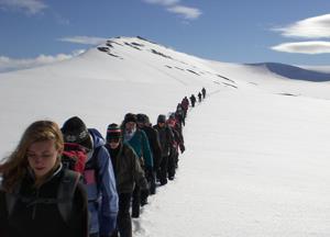 The class crosses Larsbreen Glacier on Svalbard, Norway, during the first course originating from a new partnership between the U of I and universities in Sweden. (Photo by Mark Safstrom)