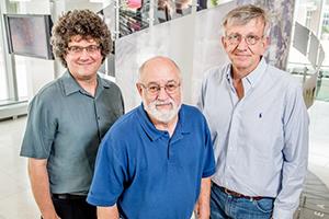 Chemistry professor Jonathan Sweedler, left, microbiology professor John Cronan, biochemistry professor John Gerlt and their colleagues developed a streamlined approach to discovering enzyme function. (Photo by L. Brian Stauffer)
