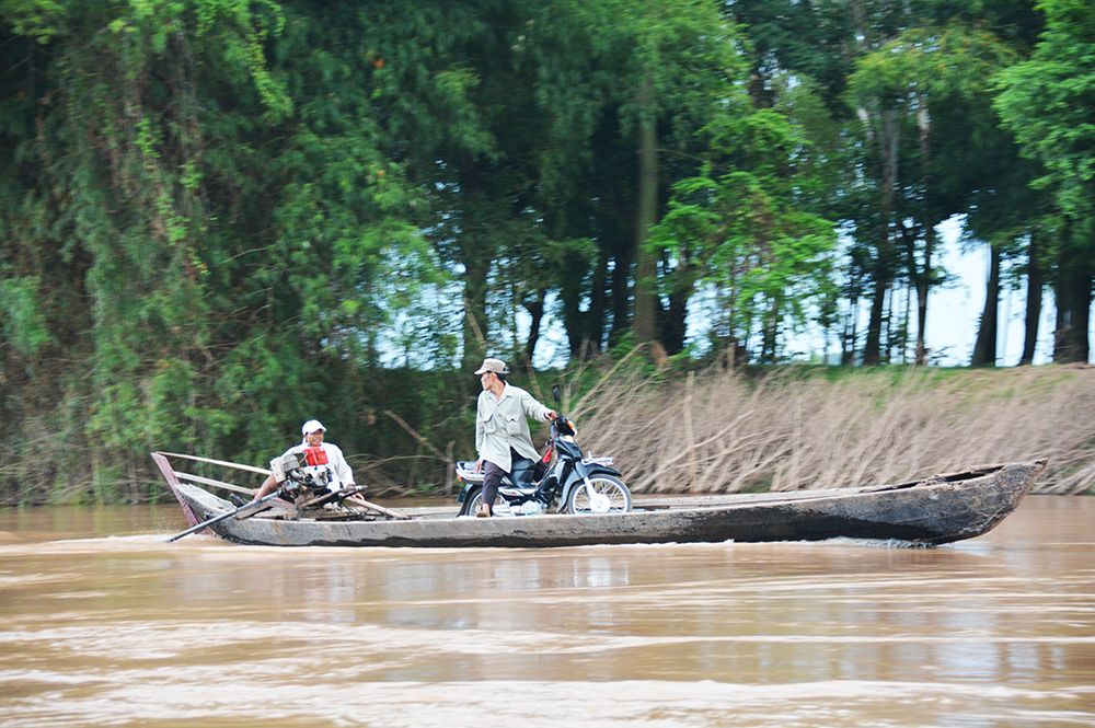 Rivers are an essential conduit for travel - even by motorbike - and commerce within the Mekong River basin. (Photo courtesy of Jim Best.) 