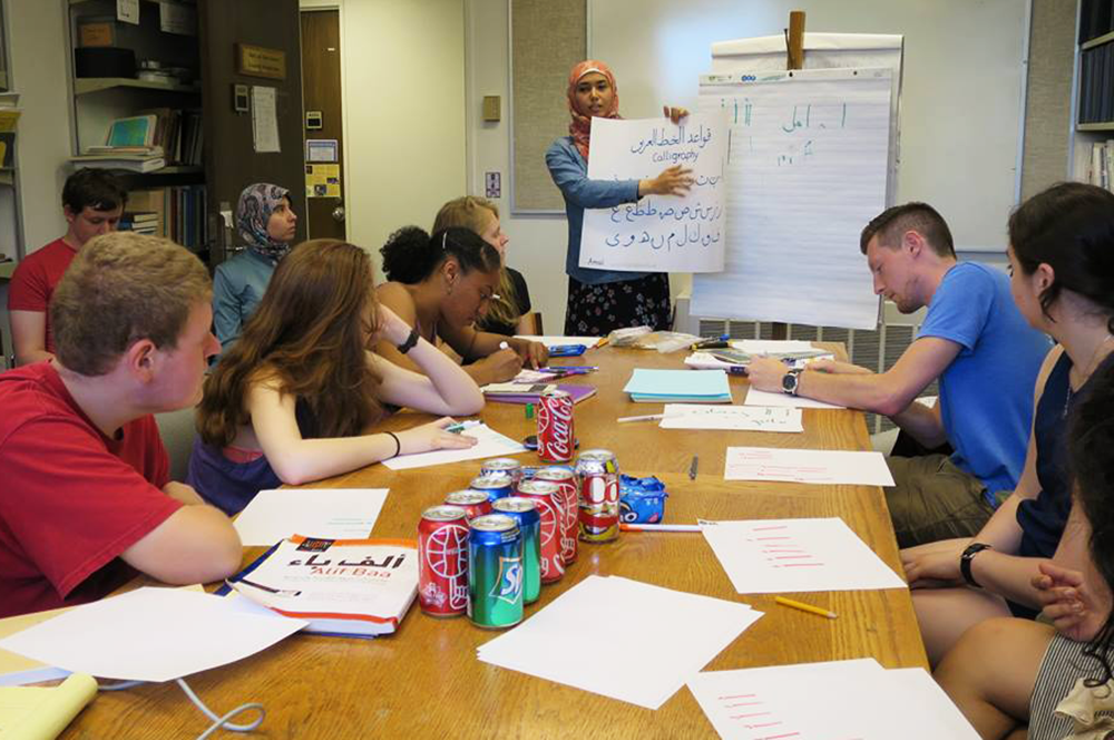 Students participated in an Arabic calligraphy workshop during one of  the events in the Summer Institute for Languages of the Muslim World at Illinois in summer 2016. (Photo courtesy of Eman Sadaah.) 