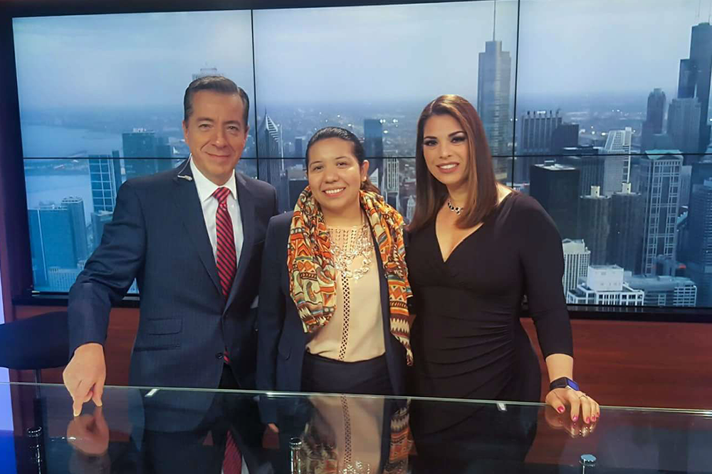 Daissy Dominguez, center, has been prominent in her legal work regarding immigration. This photo was taken after an interview at the television network Univision Noticias with Jorge Barbosa and Sonia Garcia. 