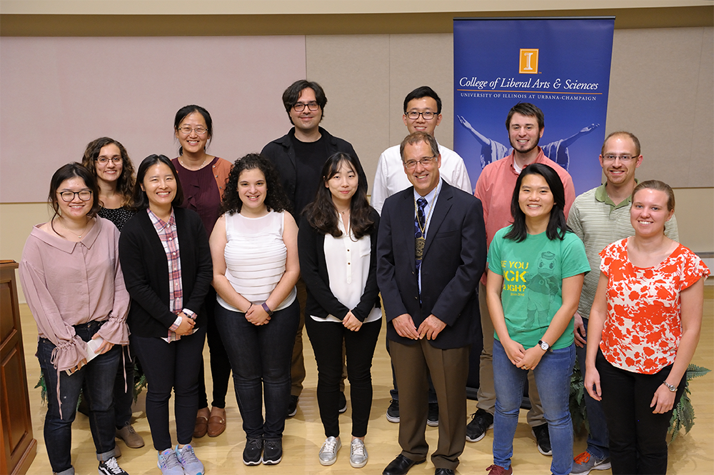 Andrew A. Gewirth celebrates with students at the ceremony recognizing him as the Peter C. and Gretchen Miller Markunas Professor of Chemistry. (Thompson-McClellan)