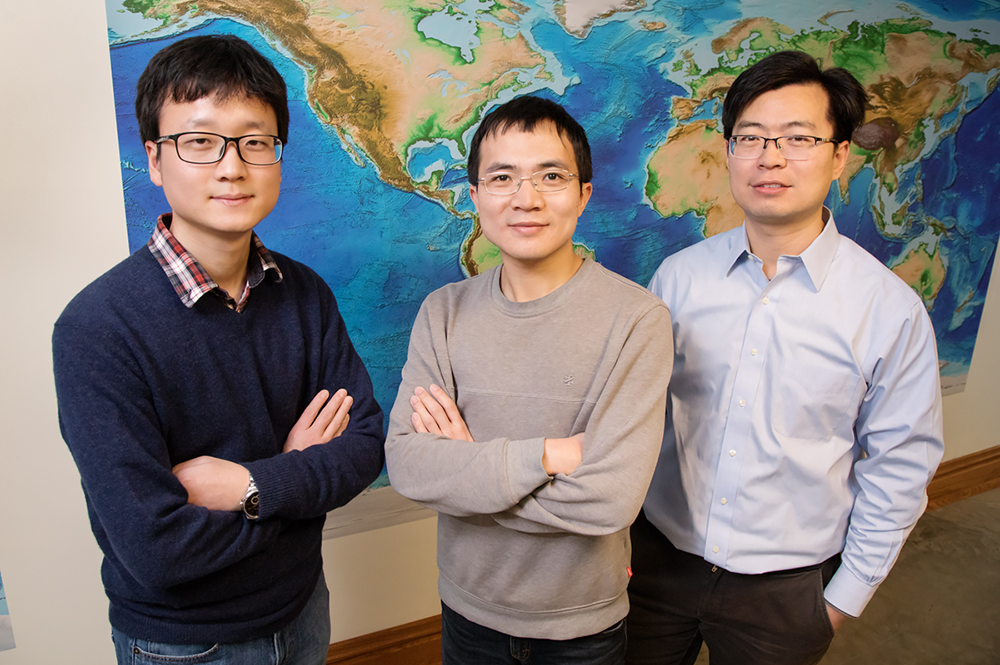 From left, geology graduate students Jiashun Hu and Quan Zhou and professor Lijun Liu challenge traditional theories about western U.S. volcanism with new evidence from supercomputer modeling. (Photo by L. Brian Stauffer.) 
