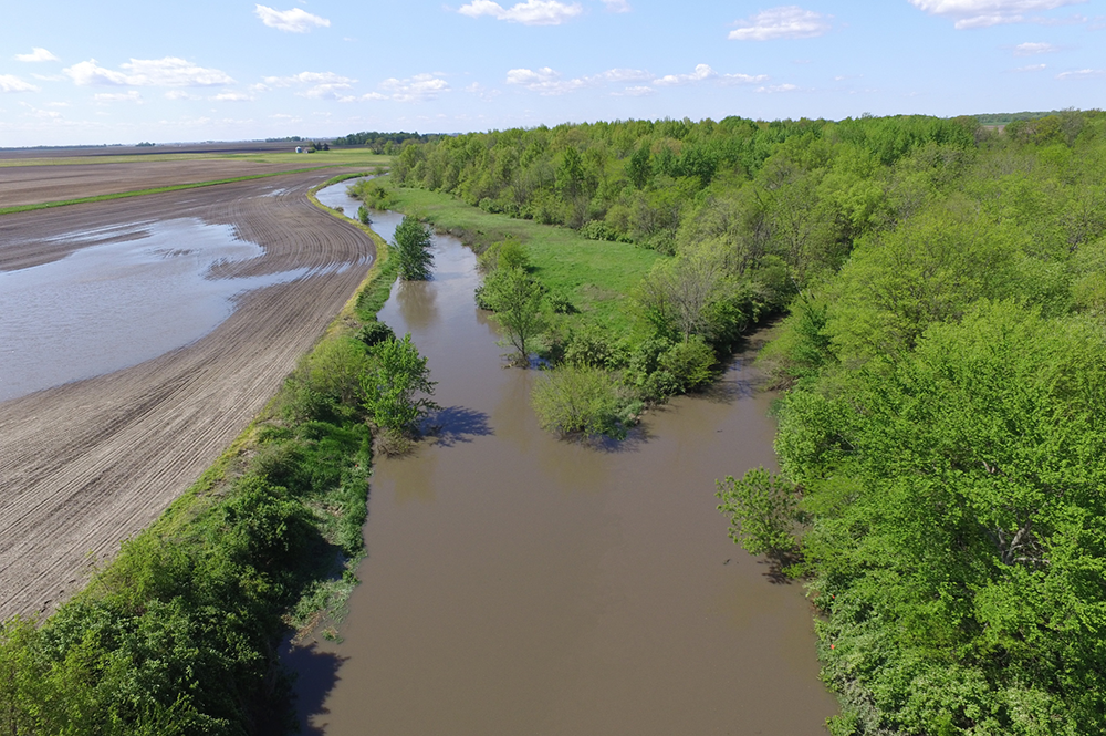 Bruce Rhoads used a drone to capture this image of standing water in farm fields after flooding along the Kaskaskia River (left) and Two-Mile Slough (right), near the Champaign-Douglas (Illinois) County border. Rhoads is a leader in the study of how rivers and streams change over time. 