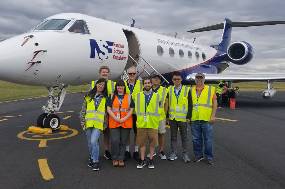 Illinois professor Bob Rauber, far right, University of Oklahoma (and former U of I) professor Greg McFarquhar, third from left, along with students from both universities, pause for a photo in Hobart, Tasmania, an Australian state. From there they studied clouds via a research airplane from the National Center for Atmospheric Research and National Science Foundation. (Image courtesy of Bob Rauber.) 