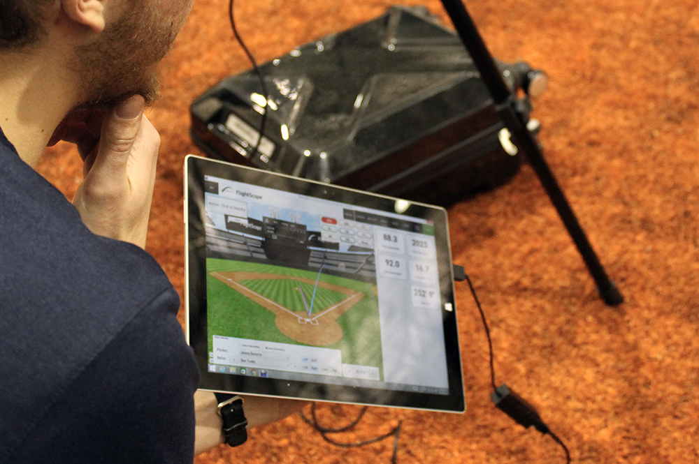 Charlie Young collects and analyzes FlightScope data. (Image courtesy of CS @ Illinois.) 