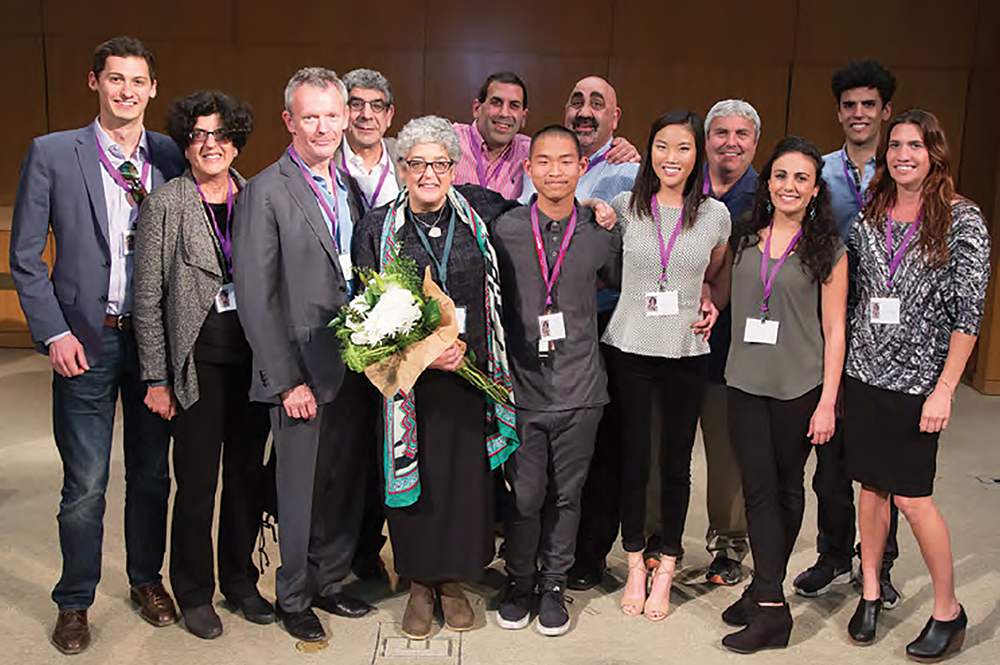 Joanne Chory with her extended family at the celebration of 10,000 days of the Chory laboratory at the Salk Institute in 2016. Front row from left: Nick Chory (nephew), Mary Ann Chory (sister), Stephen Worland (husband), Joanne, Joe Worland (son), Katie Worland (daughter), Kayla Chory (niece), and Kelley Slingerland (assistant). Back row from left: George, Paul, and Michael Chory (brothers), John Kelley (brother-in-law), and Kevin Kelley (nephew). (Image courtesy of Salk Institute for Biological Studies.) 