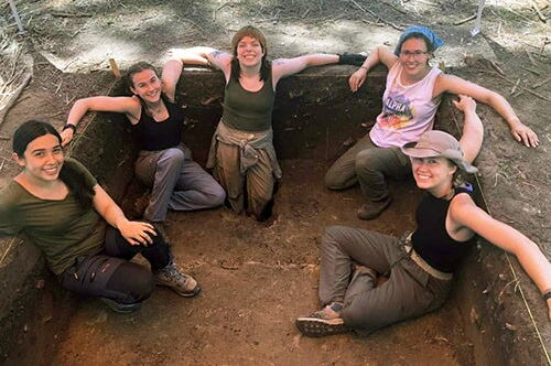 people at a digging site