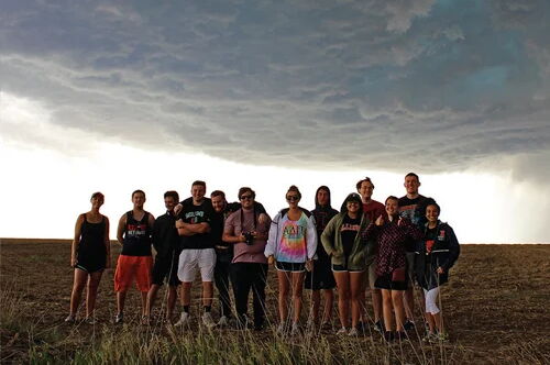 Students standing in a field