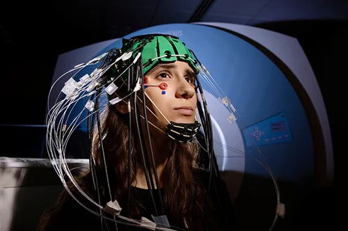 Person with electrodes on head