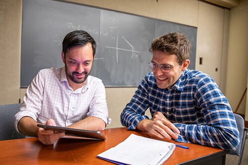 two people studying together