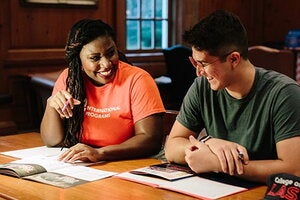 A student talks to an advisor