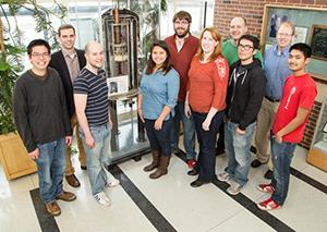 A new collaboration solved a decades-old medical mystery involving an antifungal agent. Pictured, from left: graduate student Grant Hisao; chemistry professor Martin Burke; graduate students Alex Cioffi, Katrina Diaz, Marcus Tuttle, and Mary Clay; chemistry professor Chad Rienstra; and graduate students Brice Uno, Tom Anderson, and Matt Endo. (Photo by L. Brian Stauffer.)