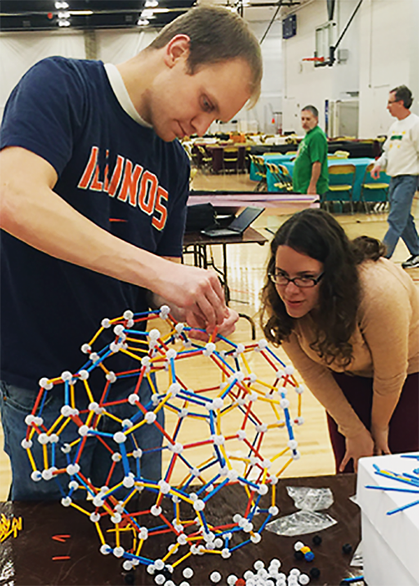 Illinois Geometry Lab volunteers create materials for outreach work. (Photo courtesy of the Department of Mathematics.) 