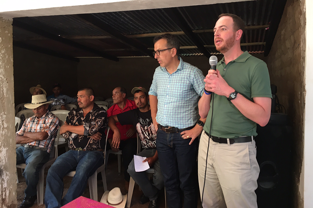 Matt Eisenbrandt, right, speaks to a community group in Guatemala as part of his work advocating for victims of abuses and atrocities (image courtesy of Matt Eisenbrandt.) 
