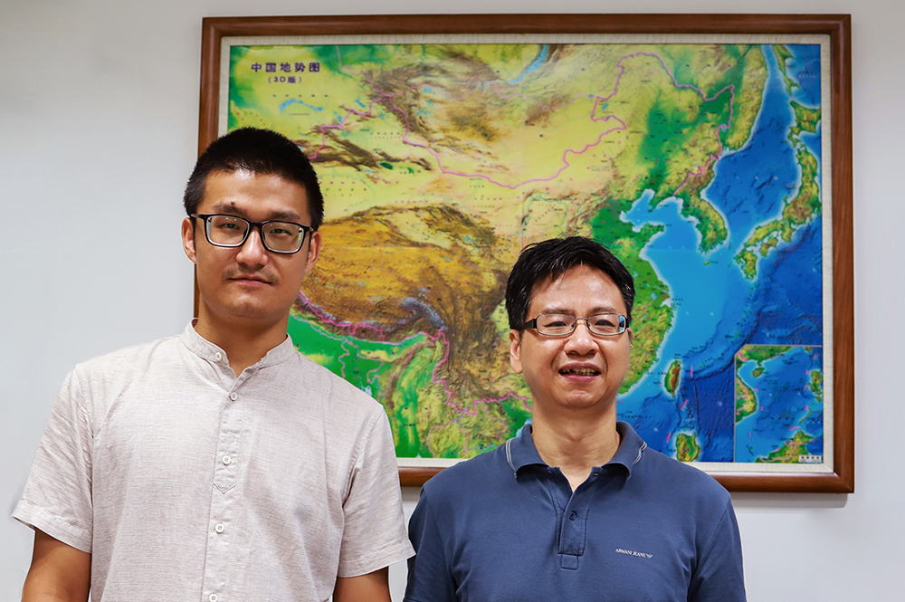 Illinois geology professor Xiaodong Song, right, and graduate student Jiangtao Li are authors of a new study that suggests rips in the upper mantle layer of the Indian tectonic plate are responsible for the locations of earthquakes and the surface deformation seen in southern Tibet. (Photo courtesy of Xiaodong Song.) 