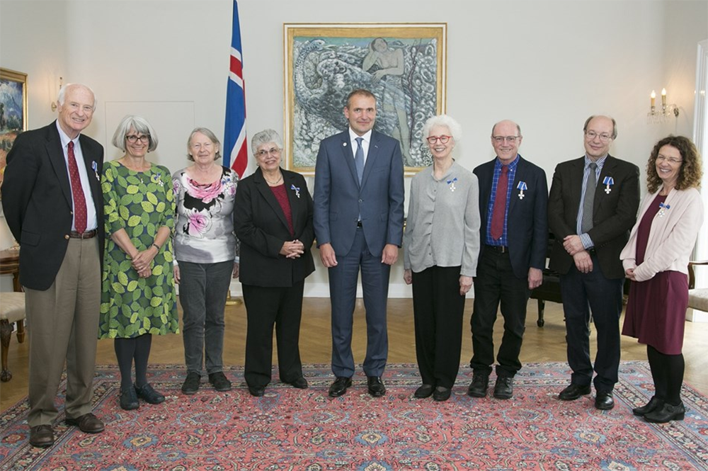 The president of Iceland, center, honors scholars for their work in the area of medieval Icelandic literature. U of I professor emerita Marianne Kalinke is immediately to the left of the president, in black. (Photo by the Office of the President in Iceland.) 