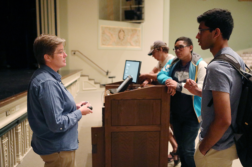 Rebecca Sandefur, left, speaks with students in Lincoln Hall Theater. (Image courtesy of John D. and Catherine T. MacArthur Foundation.) 