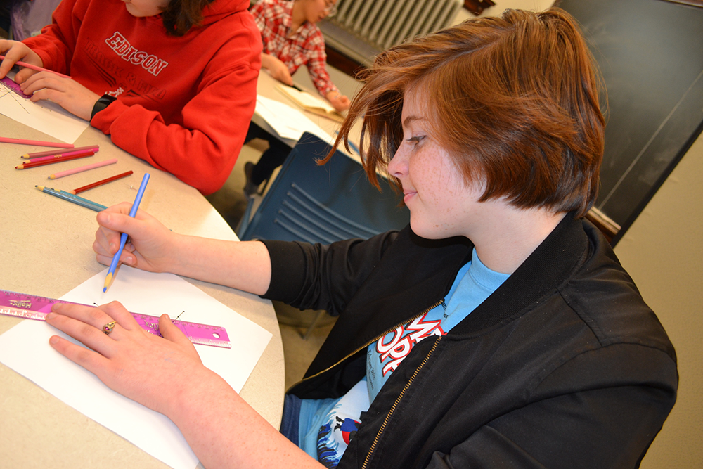 Genna Roth, a high school sophomore who dreams of using math and art to create film, attends a workshop hosted by the U of I chapter of the Association for Women in Mathematics. (Photo courtesy of AWM.) 