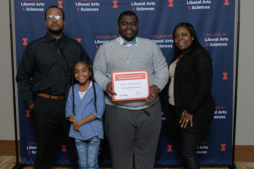 De'Anthony Means, a freshman, poses at the LAS Scholarship Celebration. He has plans to attend law school and is the recipient of the Herbert J. Smith Scholarship. (Della Perrone.) 