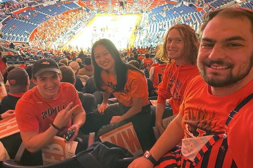 Alyssa Shih with a group of friends at a University of Illinois basketball game